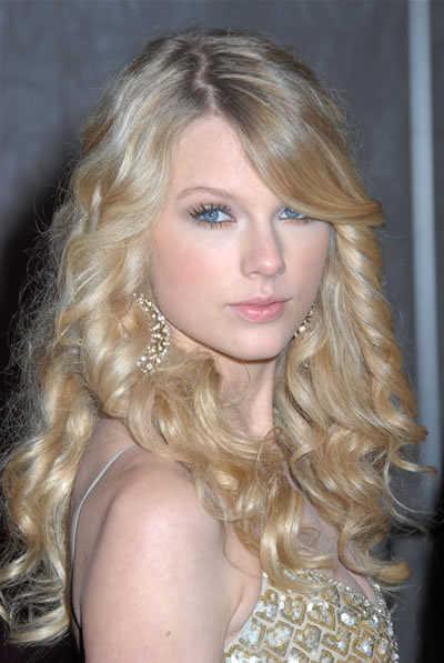 What a difference a haircut makes. Taylor Swift's Long Curly Hair with Side-Part