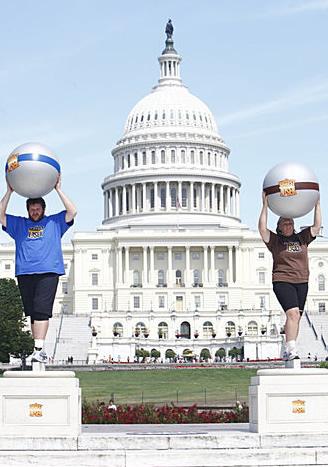Toughest Biggest Loser Workouts Season 8 Liz and Rudy Holding Up Balls in Washington DC