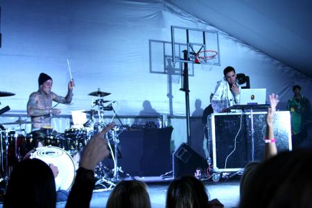 Travis Barker drumming on stage