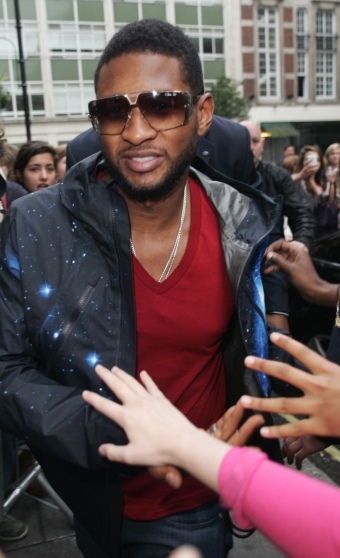 Usher parts the mob