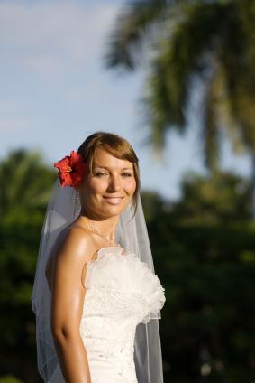 Side Part Bun with Flower Accent