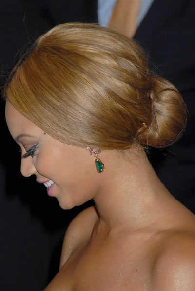 middle parting hairstyles. Beyonce#39;s bun hairstyle