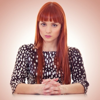 Red Hair - Blunt Bangs and Long Layers. This hairstyle features blunt bangs 