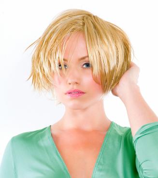 This messy, short, layered bob haircut is undercut at the bottom to allow This messy, short, layered bob haircut is undercut at the bottom to allow