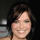 Mandy Moore's Brunette Pulled Back Hairstyle with Bangs