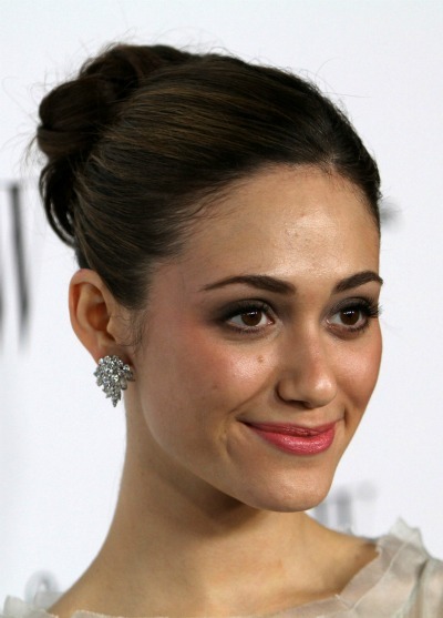 Emmy Rossum is simple and adorable with this bun hairstyle that's twisted
