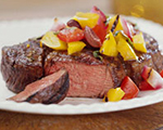 Beef steaks with yellow pepper and onion relish