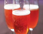 Campari, Maraschino and Sake Champagne Cocktail