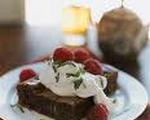 Dark chocolate brownies with orange cream cheese frosting