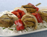 Grilled Indian pork kebabs with sweet onions and red bell peppers