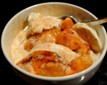 Grilled Peaches with Brown Sugar over Vanilla Bean Ice Cream