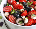 Tomato, Olive, and Mozzarella Salad with Basil Vinaigrette