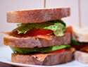 Salmon lettuce tomato sandwich