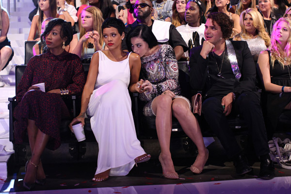 Katy Perry lovingly kisses Rihanna's shoulder at the VMAs