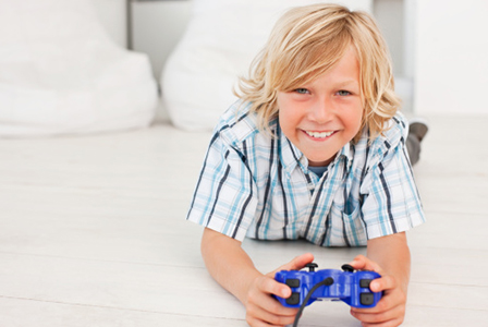 Boy playing video games | Sheknows.com
