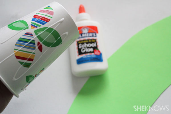 DIY Fire-breathing dragon craft: Glue paper on cup