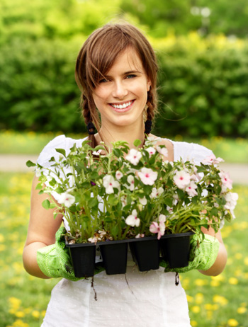 http://cdn.sheknows.com/articles/happy-woman-gardening.jpg