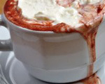 Hot red velvet cocoa and whipped cream cheese frosting