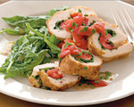 Spinach and tomato-stuffed chicken roulade